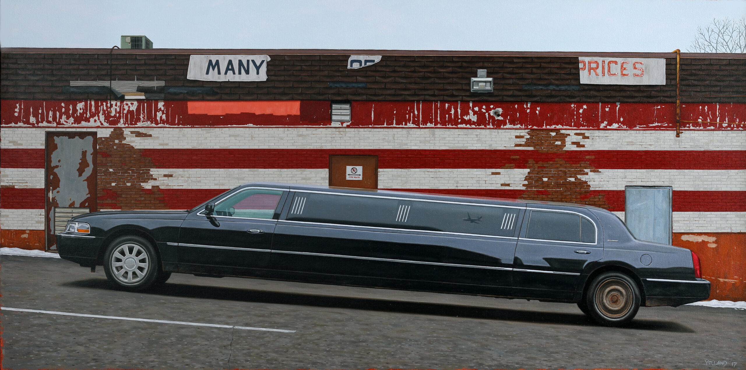 Sean Yelland-Huge limo on sloped street outside a bargain store